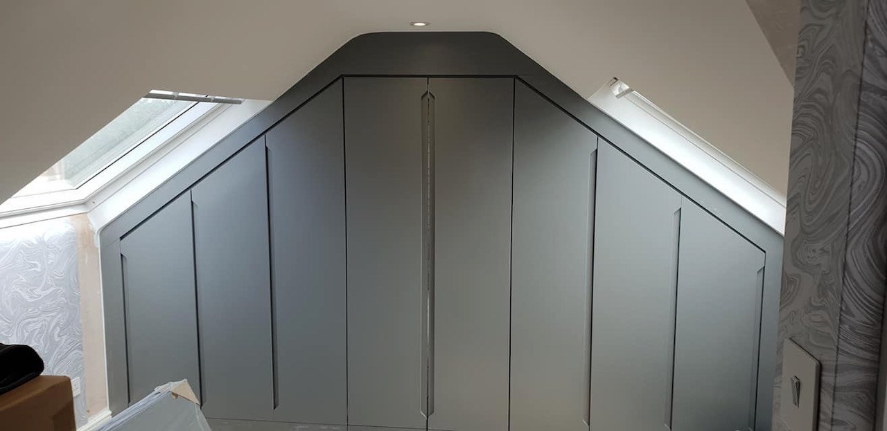 Angled ceiling fitted wardrobes
