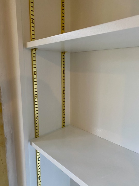Brass bookcase strips