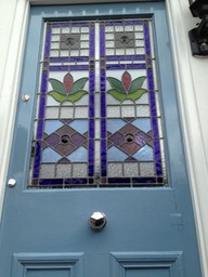 Stained glass reclaimed front doors. 
