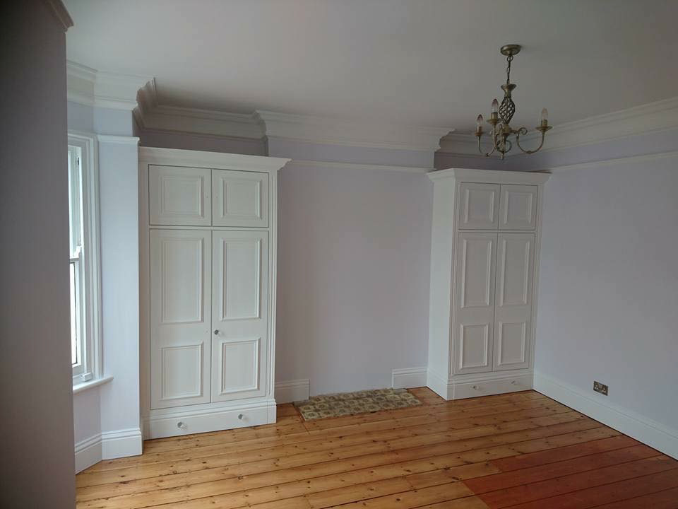 White tradiational alcove wardrobes